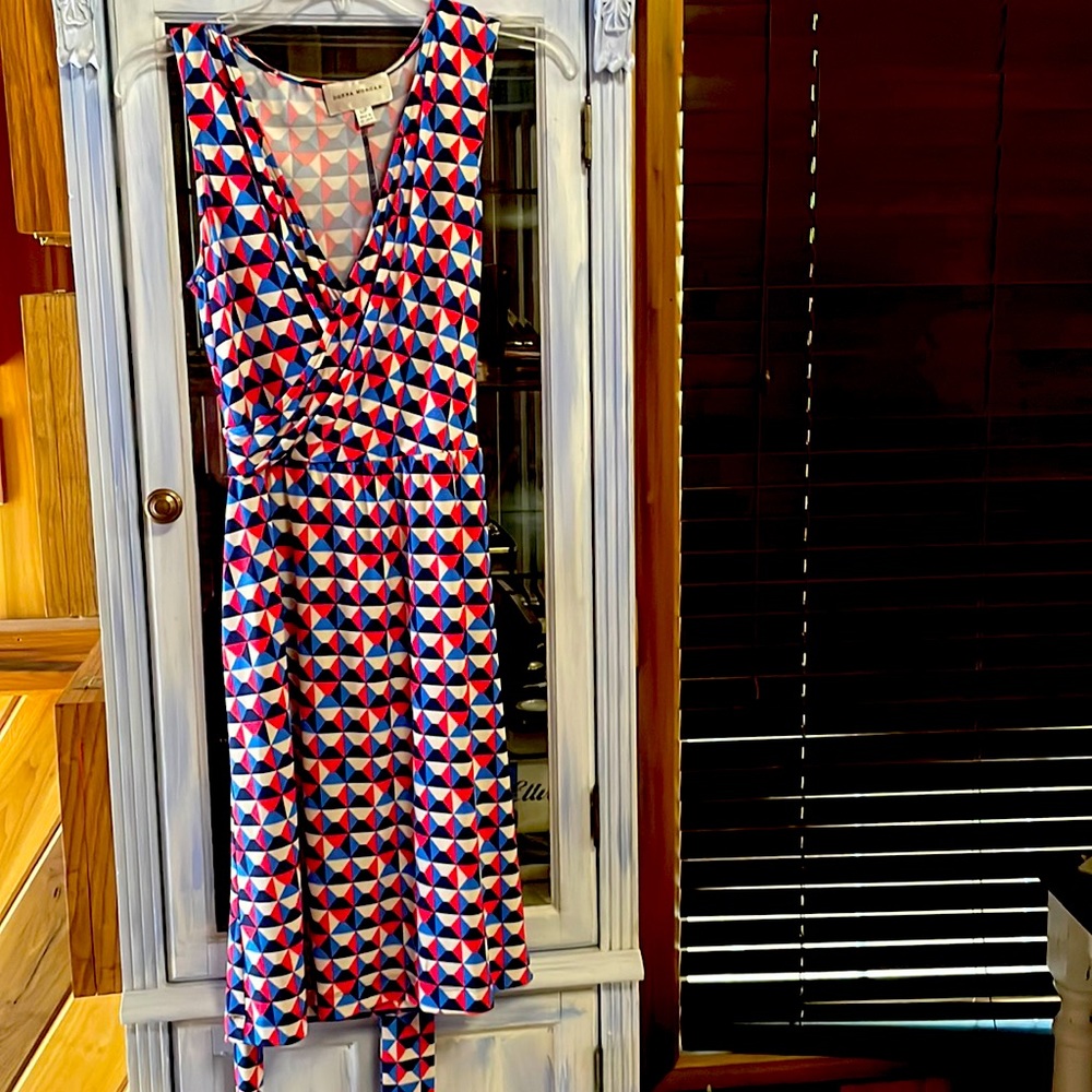 Donna Morgan size 12 petite mid length dress. Multicolored. Faux wrap dress.